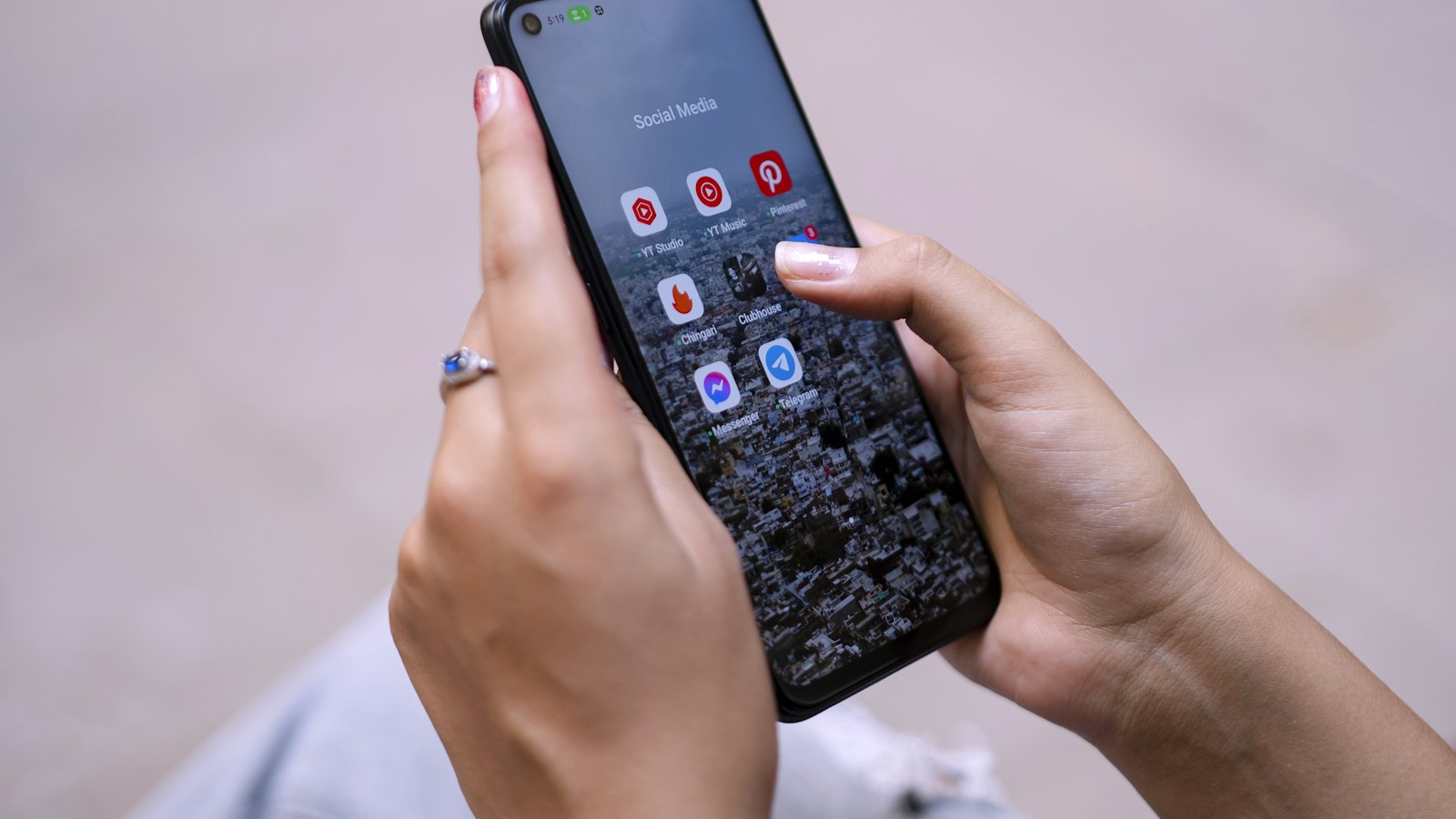 A woman holding a smartphone