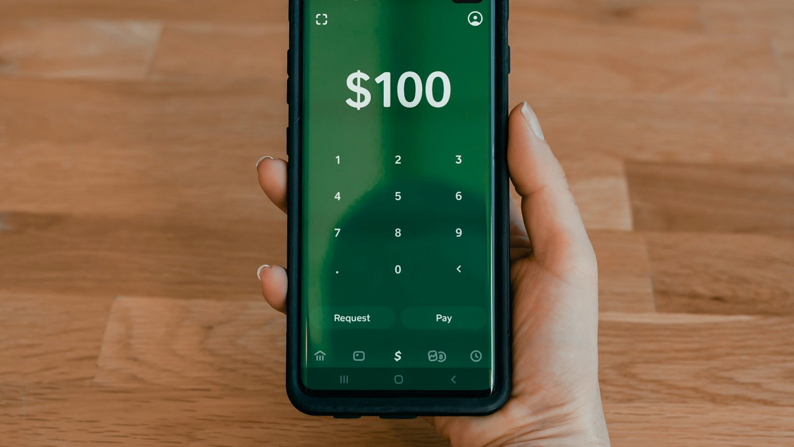 A phone showing a payment screen