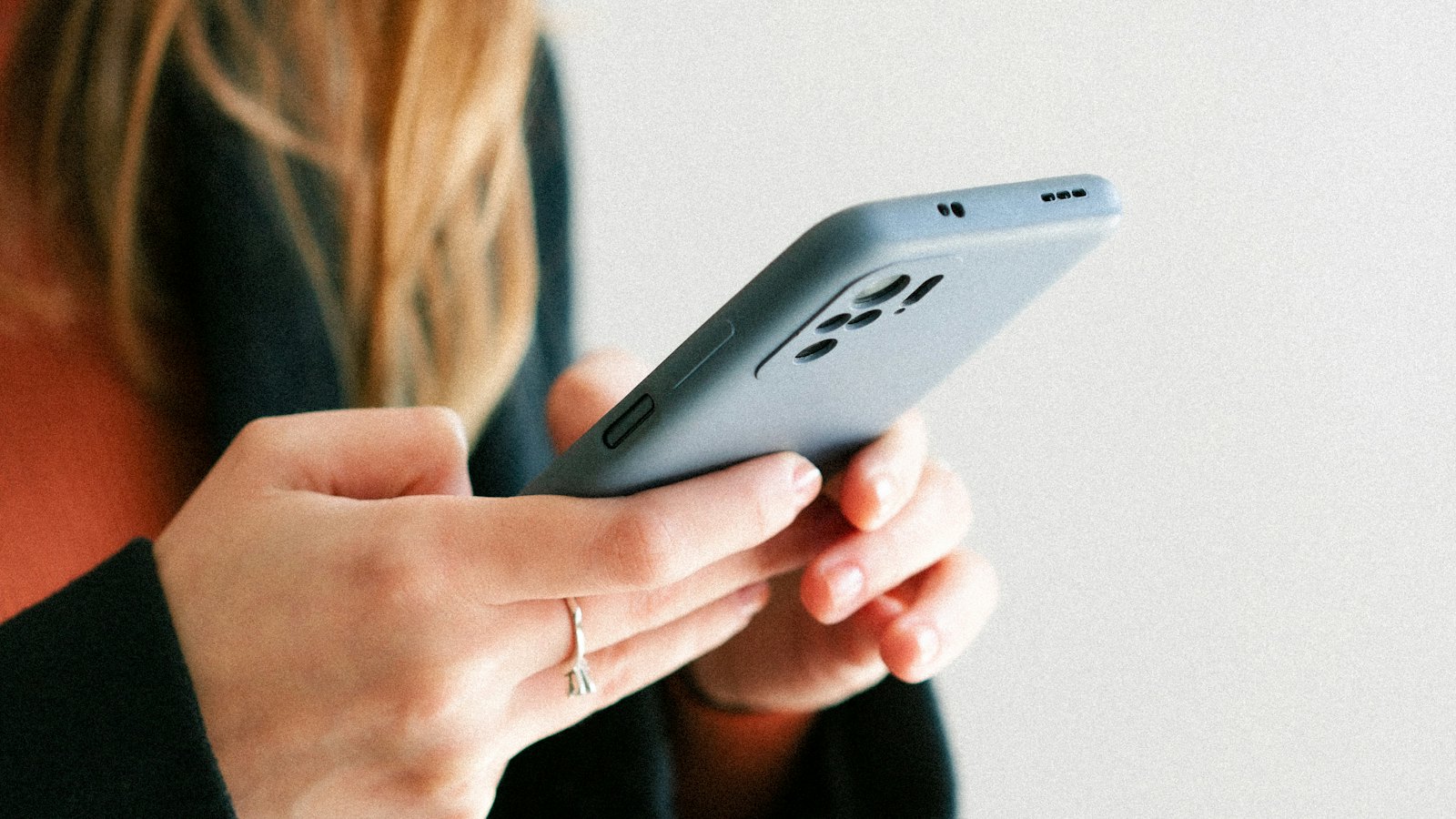 Hands holding a smartphone