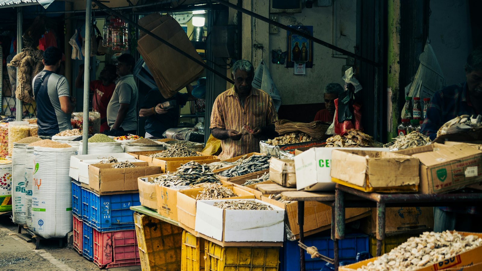 Goods stacked at a market stall