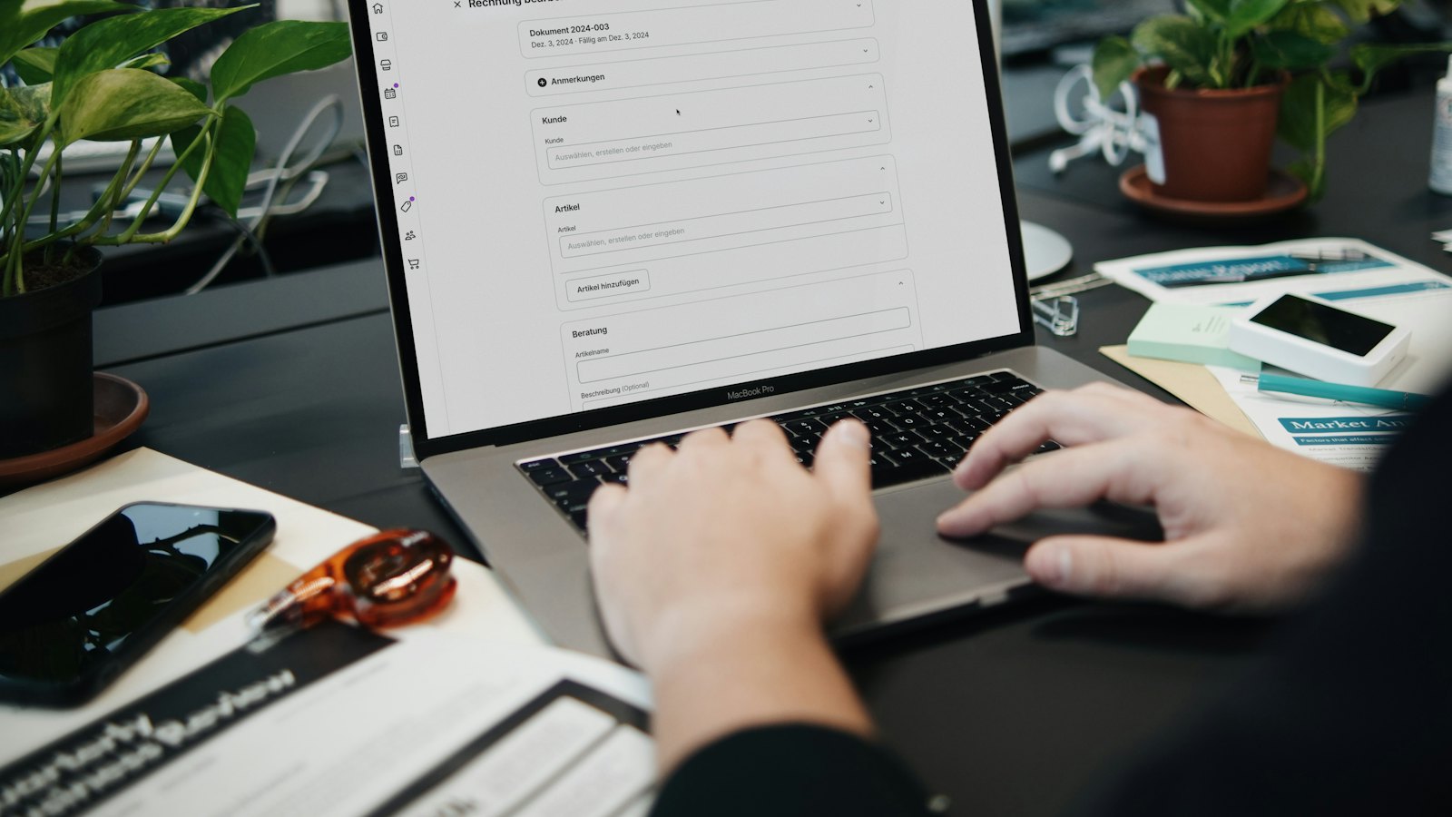 A person using a web app on a laptop