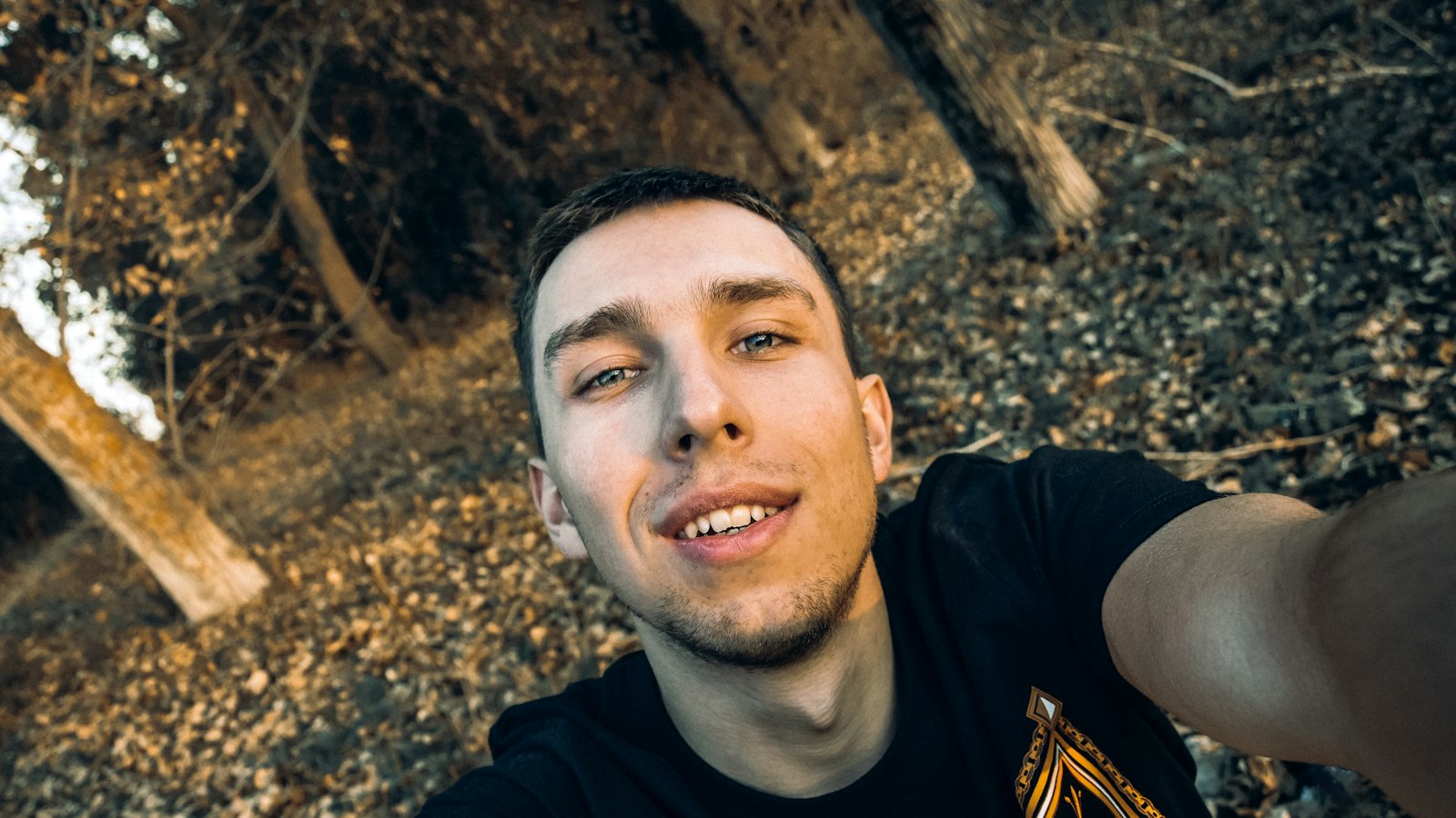 A man looking into a phone camera