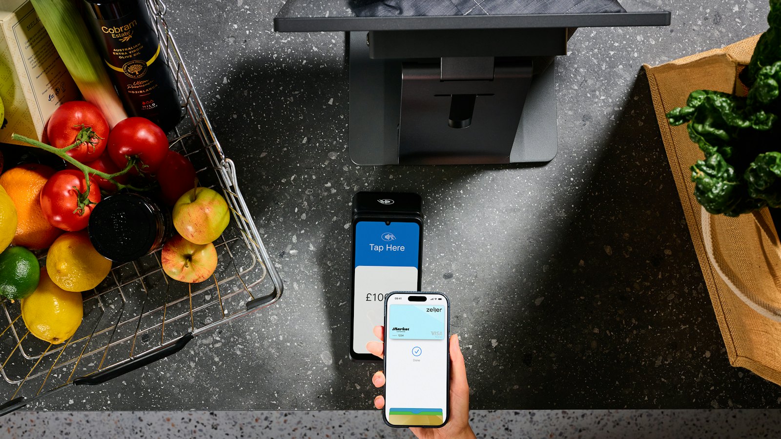 A phone used to pay at a checkout