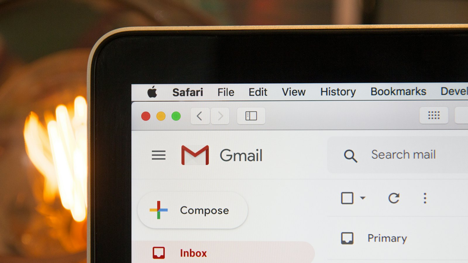 A laptop screen showing a webmail inbox in a browser