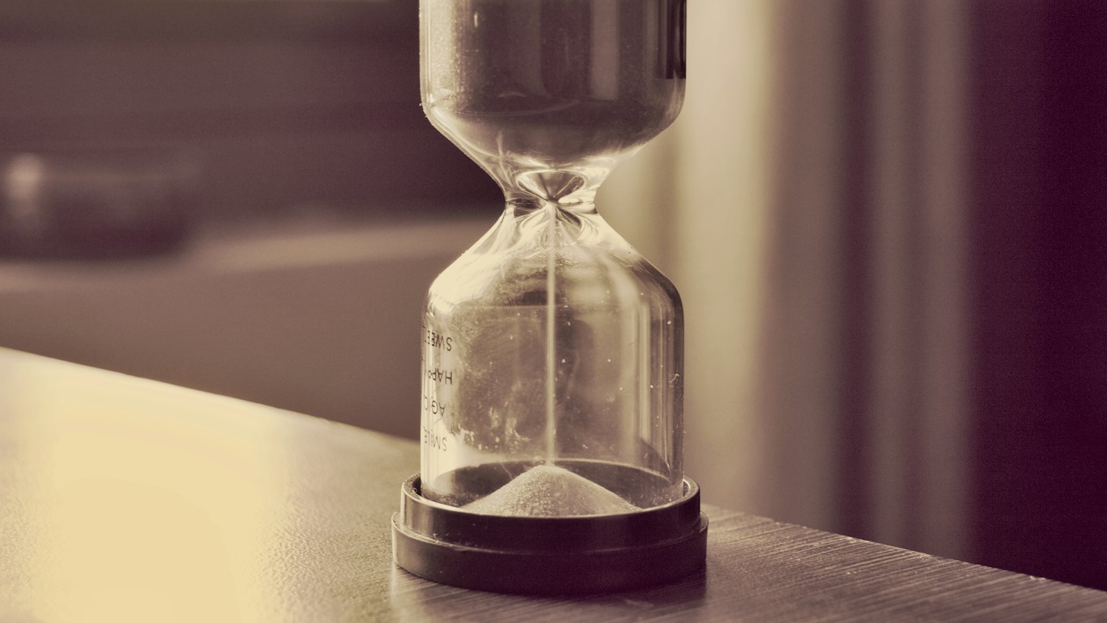 An hourglass on a table