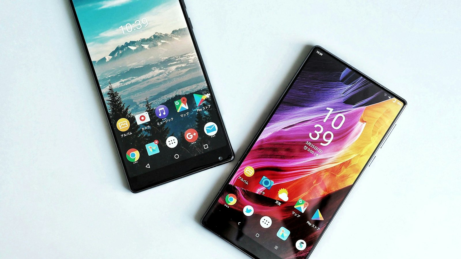 Two smartphones side by side